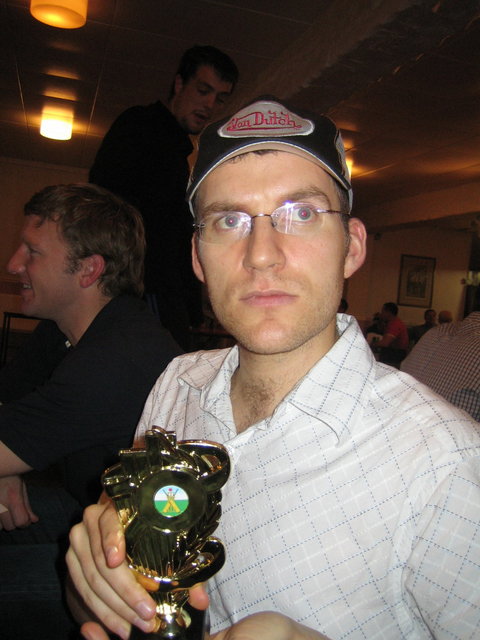 Steve in reflective pose with stunning personal trophy